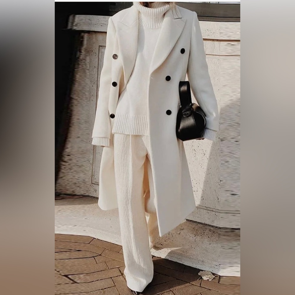 White coat with black buttons